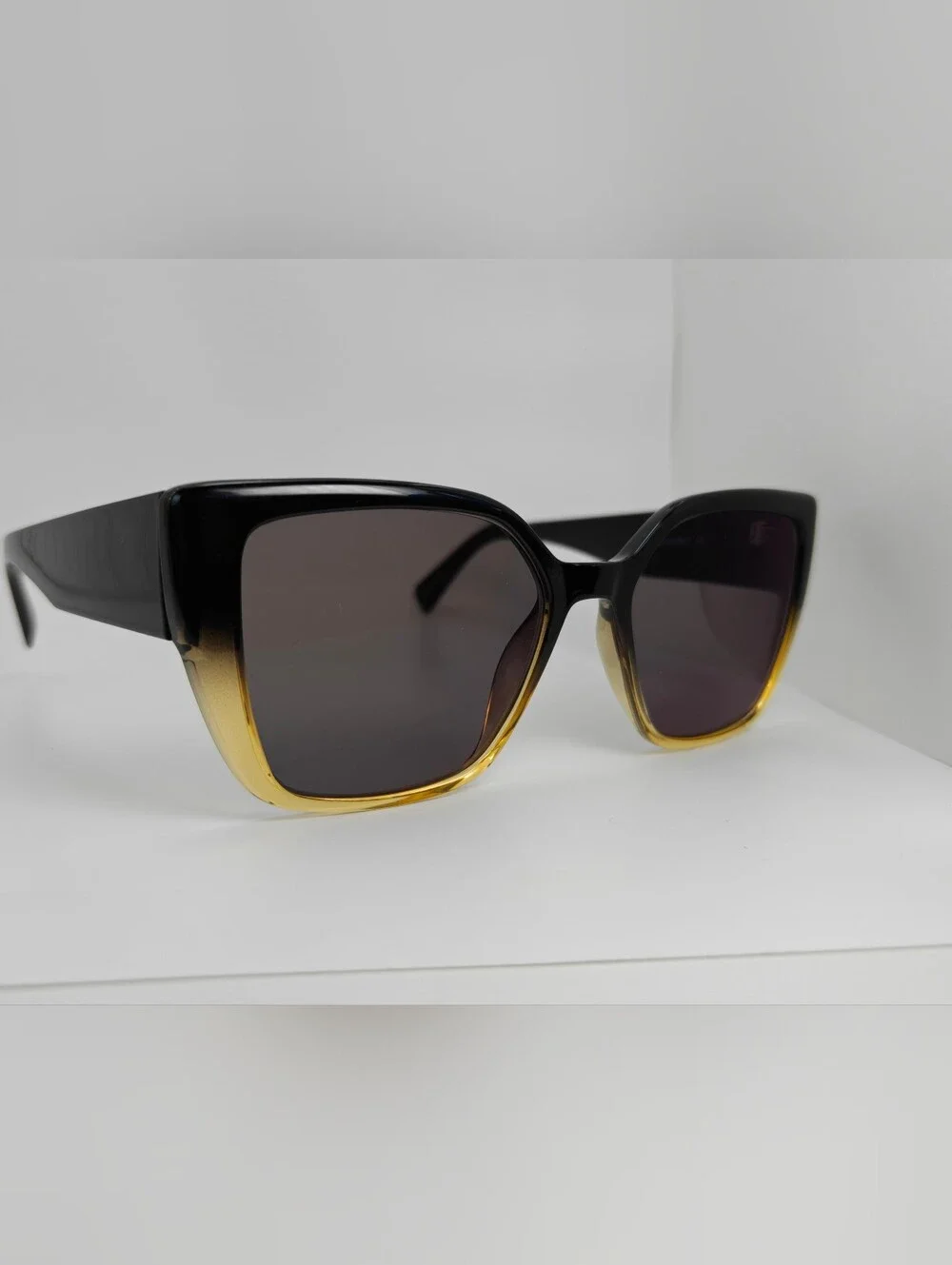 Pierrette. Women's Black to Gold Gradient Cat-Eye Sunglasses.